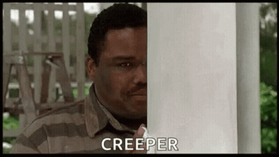 Man In Striped Shirt Peeking And Saying Creeper GIF