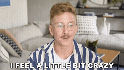 Man In Striped Shirt Saying I Feel Crazy GIF
