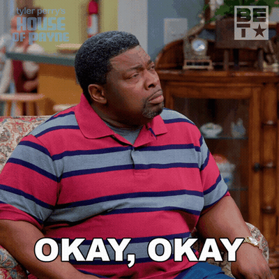 Man In Striped Shirt Saying Okay GIF