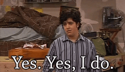 Man In Striped Shirt Saying Yes GIF