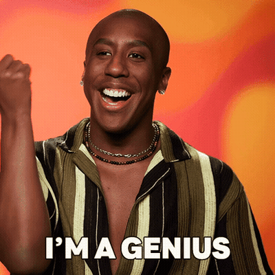 Man In Striped Shirt Says I'm A Genius Fist In Air GIF