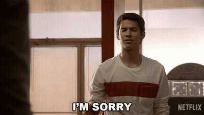 Man In Striped Shirt Says I'm Sorry GIF