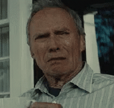 Man In Striped Shirt Sitting By Window GIF
