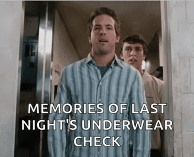 Man In Striped Shirt Standing In Doorway Next To Man In White Shirt GIF