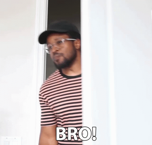 Man In Striped Shirt Standing In Doorway Says Bro GIF