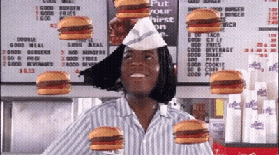 Man In Striped Shirt Surrounded By Hamburgers GIF