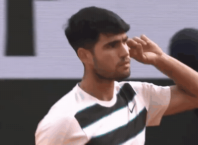 Man In Striped Shirt Wiping Nose GIF