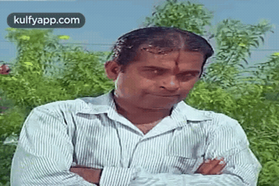 Man In Striped Shirt With Arms Crossed GIF