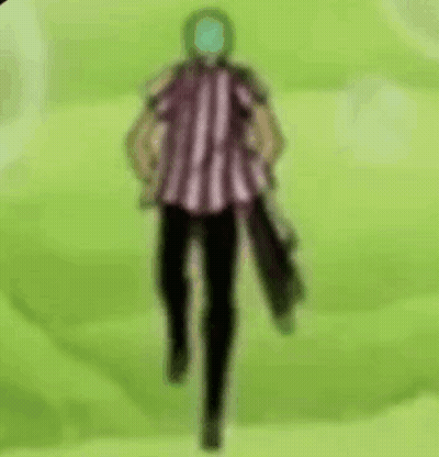 Man In Striped Shirt With Green Face Standing In Field GIF