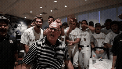 Man In Striped Shirt With Number 5 GIF