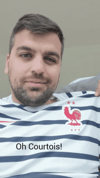 Man In Striped Shirt With Rooster Oh Courtois GIF