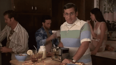 Man In Striped Shirt With Toaster And Cereal GIF