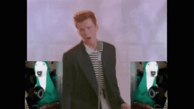 Man In Striped Suit Singing Amidst Animal Pictures GIF