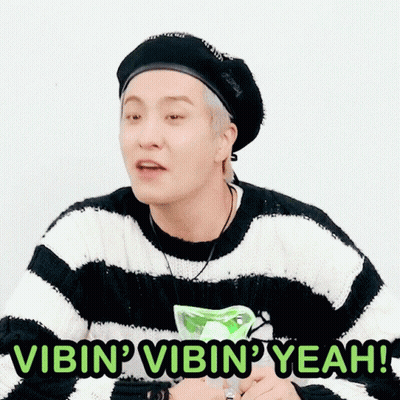 Man In Striped Sweater And Black Hat Saying Vibin Vibin Yeah GIF