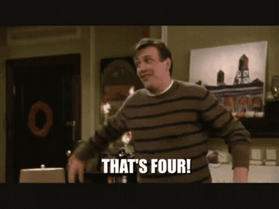 Man in Striped Sweater Saying That's Four