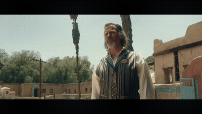 Man In Striped Vest At Motel GIF