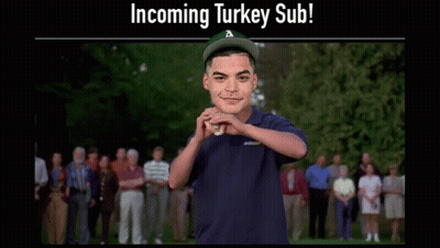 Man In Subway Shirt Holding Turkey Sub GIF