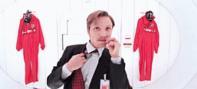 Man In Suit Adjusting Bow Tie GIF