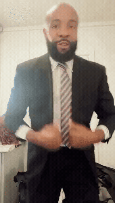 Man In Suit Adjusting Jacket GIF