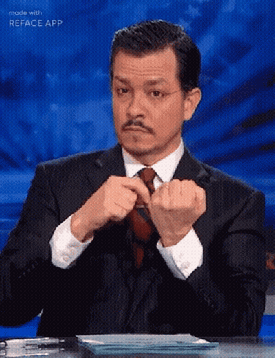 Man In Suit Adjusting Tie GIF