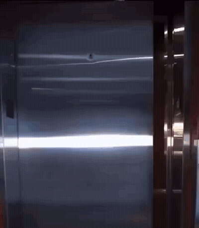 Man In Suit Adjusting Tie GIF