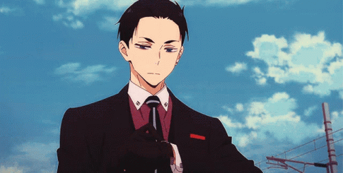 Man In Suit Adjusting Watch GIF