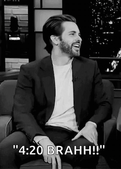 Man In Suit And Beard Laughing Black And White GIF