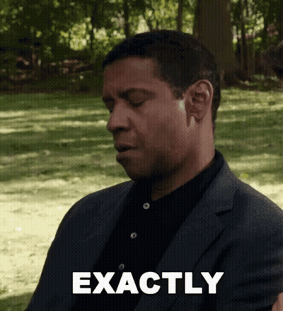Man In Suit And Black Shirt Saying Exactly GIF