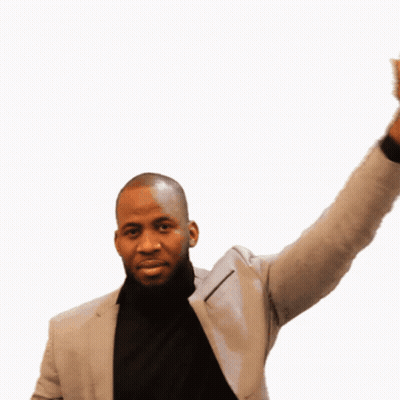 Man In Suit And Black Turtleneck Waving GIF