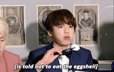 Man In Suit And Bow Tie Saying Not Eating Eggshell GIF