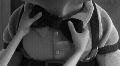 Man In Suit And Bow Tie Says Bow Ties Were Never Cooler GIF