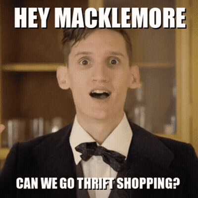 Man In Suit And Bow Tie Says Hey Macklemore GIF