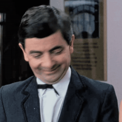 Man In Suit And Bow Tie Smiling GIF