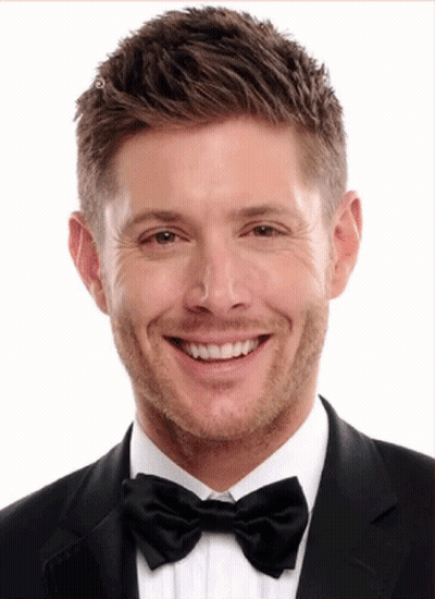 Man In Suit And Bow Tie Smiling GIF