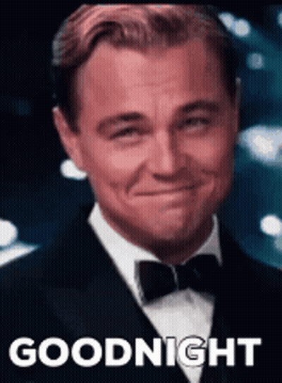 Man In Suit And Bow Tie Smiling Says Goodnight GIF