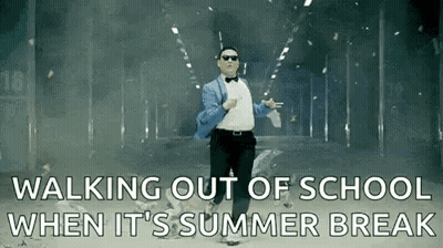 Man In Suit And Bow Tie Walking Out Of School GIF