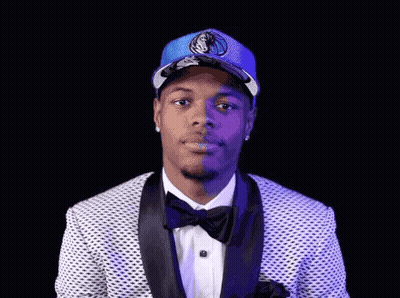 Man In Suit And Bow Tie With Dallas Mavericks Hat GIF