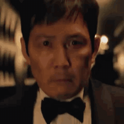 Man In Suit And Bow Tie GIF