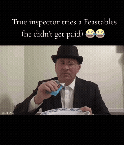 Man In Suit And Bowler Hat Eating Chocolate Bar True Inspector Tries Feastables GIF