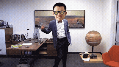 Man in Suit and Bowtie Dancing Before Mars Picture
