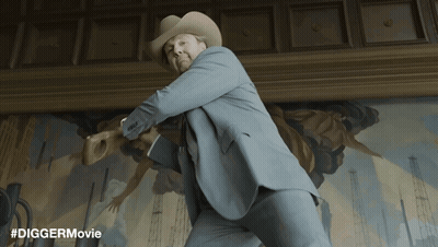 Man In Suit And Cowboy Hat In Front Of Painting #Diggermovie GIF