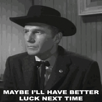 Man In Suit And Cowboy Hat Saying Maybe Better Luck Next Time GIF