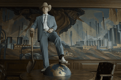 Man In Suit And Cowboy Hat Standing On Table GIF