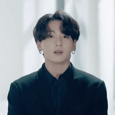 Man In Suit And Earrings GIF