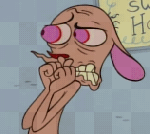 Man In Suit And Glasses Covering Head GIF