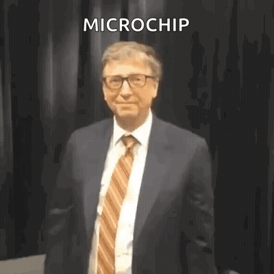Man In Suit And Glasses Dancing With Microchip Above GIF