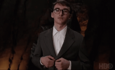 Man In Suit And Glasses In Front Of HBO GIF