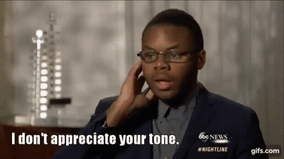Man In Suit And Glasses Saying I Don't Appreciate Your Tone GIF