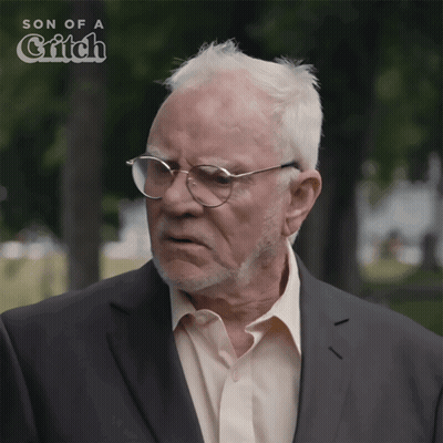 Man In Suit And Glasses Saying Jeez GIF