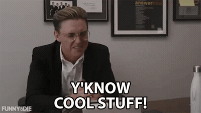 Man In Suit And Glasses Saying Y Know Cool Stuff GIF